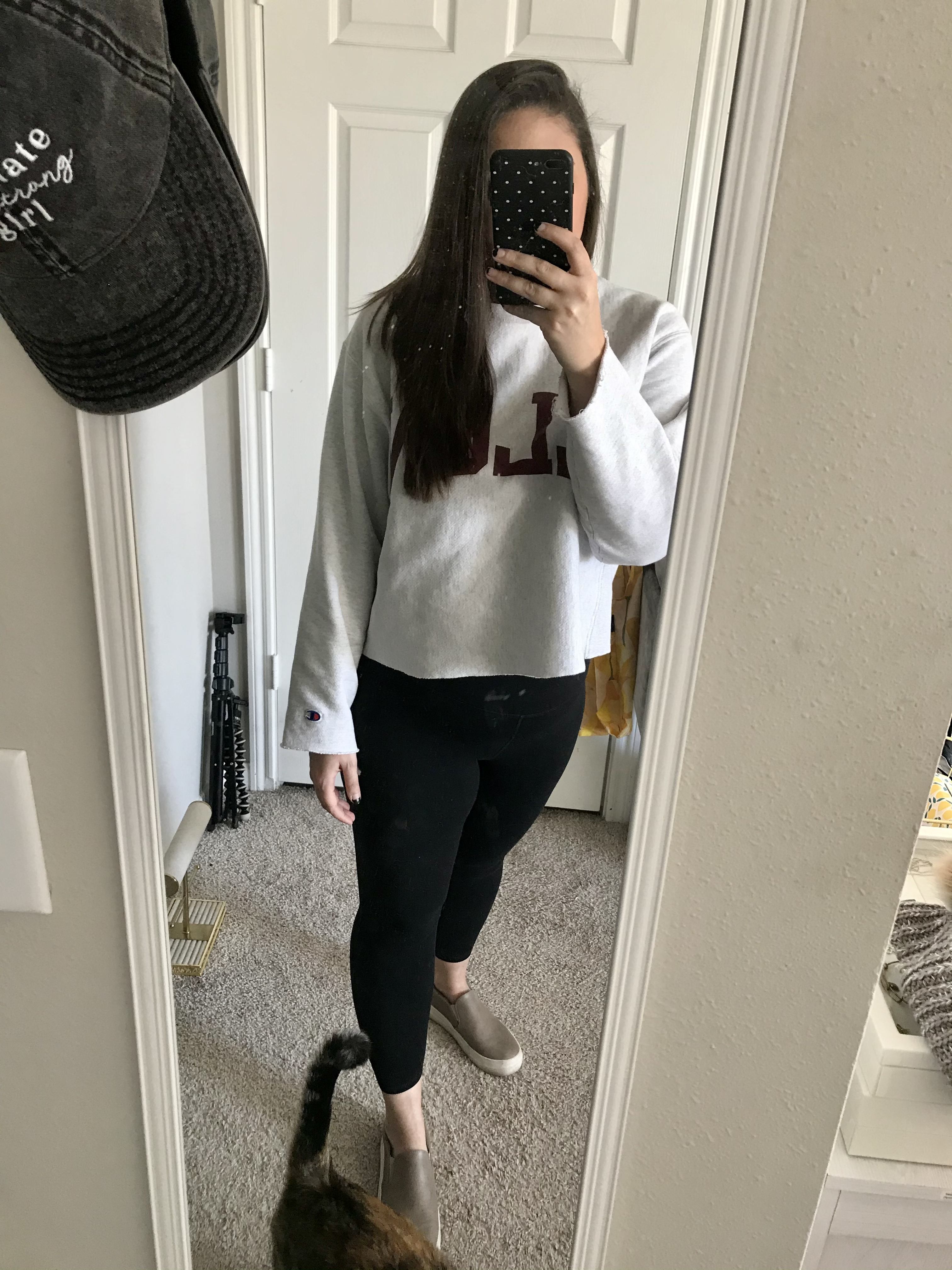 girl in sweatshirt and leggings