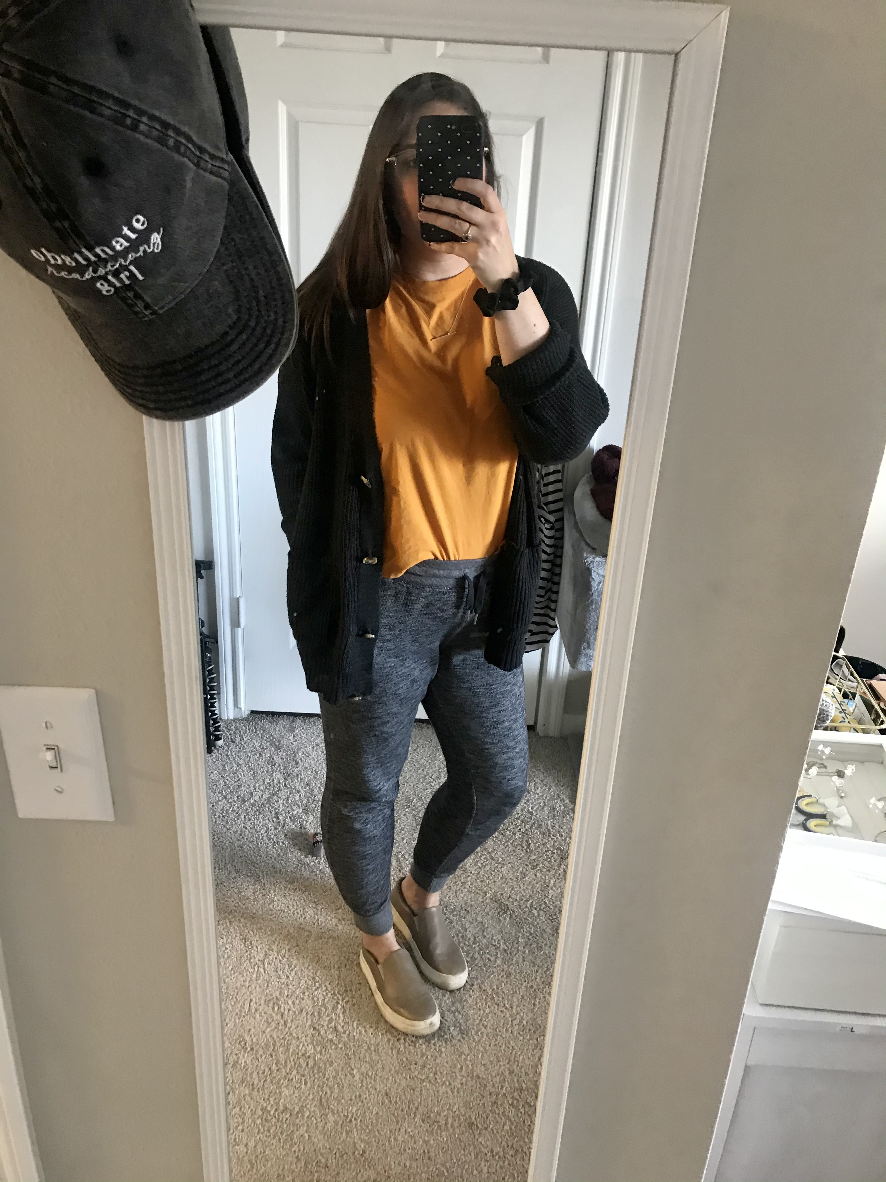 girl in mustard yellow tshirt and grey sweatpants