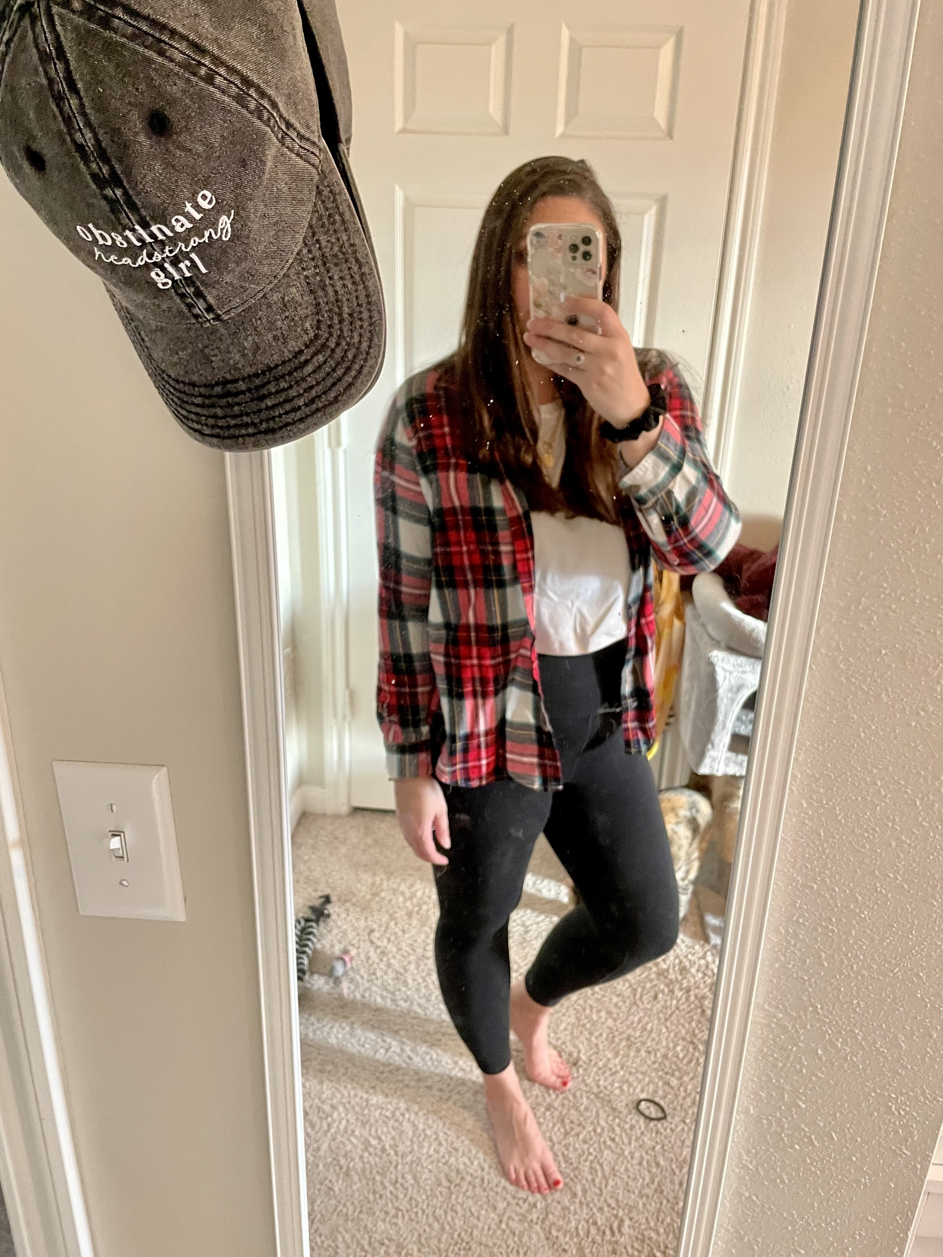 girl in plaid shirt, white top and leggings