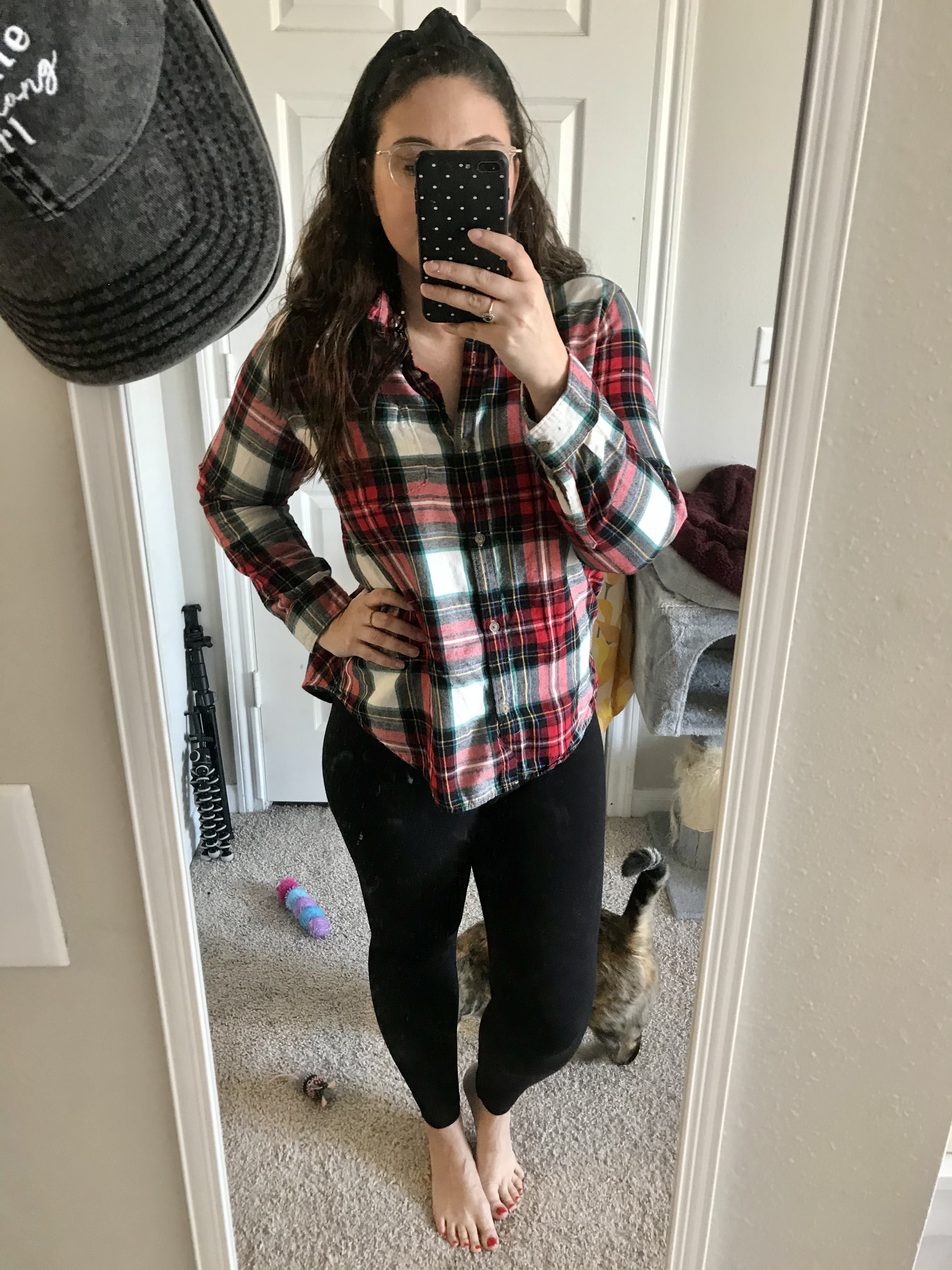 girl in flannel shirt and leggings