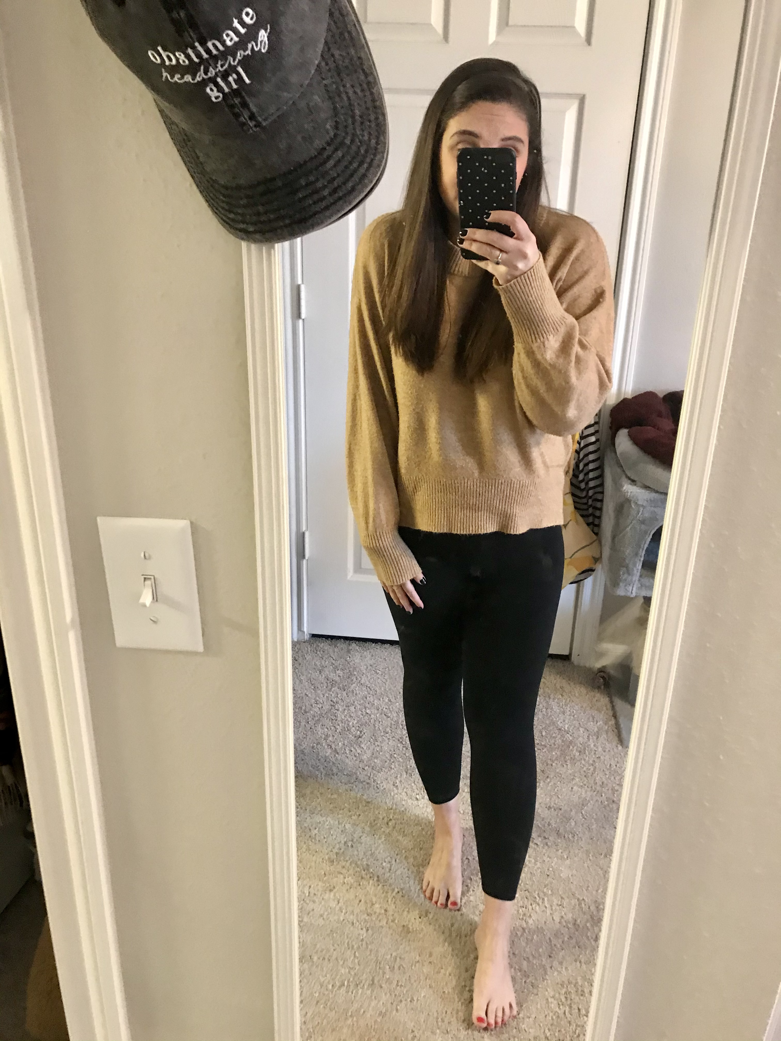 girl in brown sweater and leggings